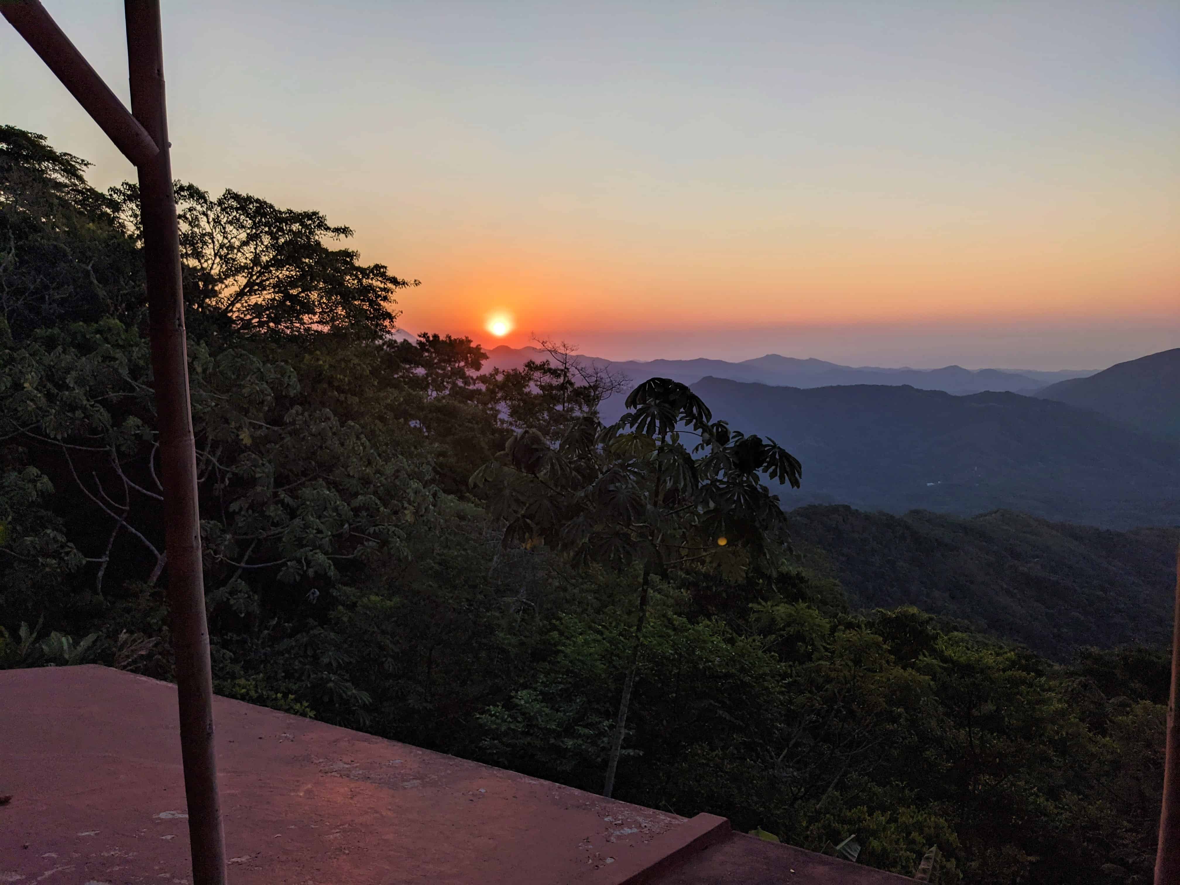 The sun rising over the mountains in Pluma. View from my suite at Finca Don Gabriel