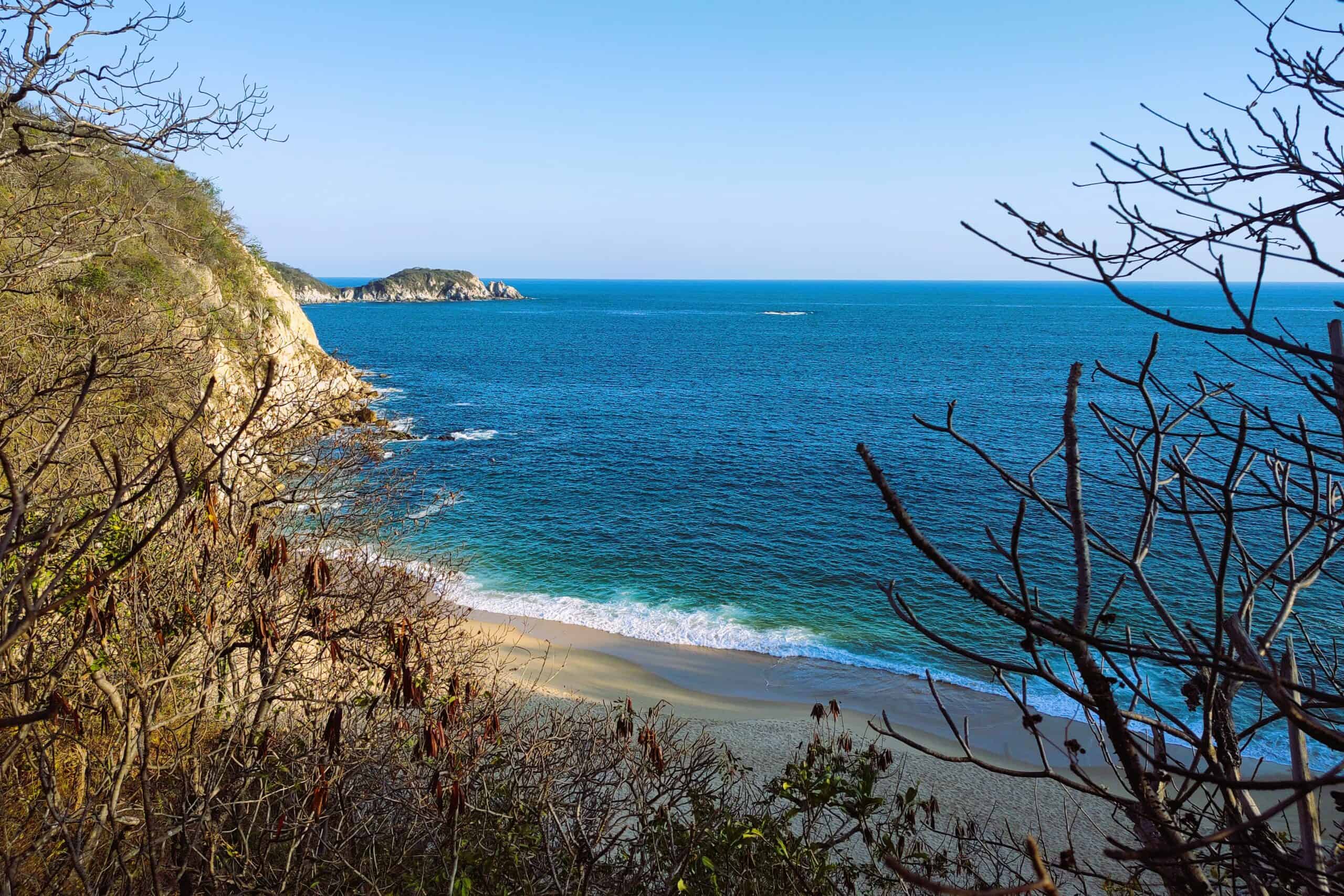 Looking down at Playa La Esperanza beach in Huatulco from the trail