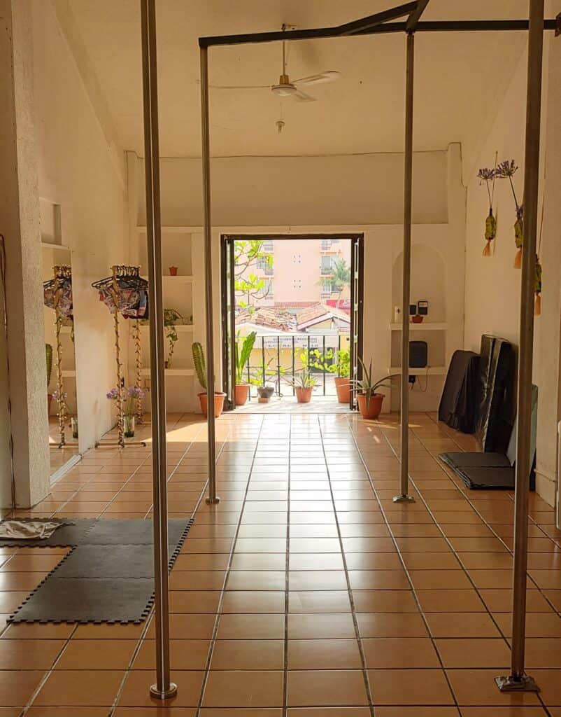4 poles amid greenery and a welcoming space at Barra Vertical Pole Dancing studio in Huatulco