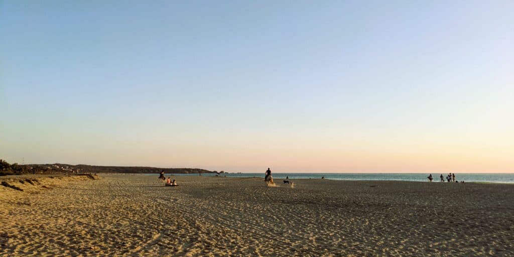 The wide sand beach of Zicatela in puerto escondido at sunset